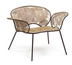 The Detonado Chair Is Made From Stainless Steel With A Wicker Patchwork Covering The Arms Back And Seat Chair Furniture Chair Luxury Chairs