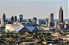 Mercedes Benz Stadium With Downtown Atlanta In The Background Photo Credit Atlanta Convention And Visitors Bureau Georgia Travel Guide Georgia Travel Travel