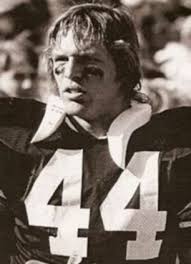 Tearjerker: Loyal dog who lay by his Navy SEAL master's coffin during  funeral to be football mascot in soldier's home state