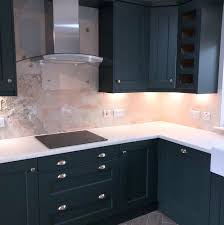 Stunning grey gloss kitchen with porcelain tiled floor and corian worktops. Gl Kitchens Home Facebook