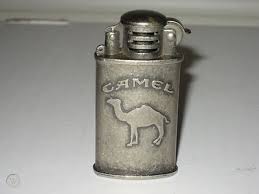 1 1/2 wide by 2 1/2 tall by 3/8 wide. Vintage Camel Cigarette Lighter Pat No 96 3 25535 5 334719683