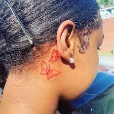 Butterfly tattoo behind ear red ink. Tattoo Uploaded By Tariq Fowler Behind The Ear 1207651 Tattoodo