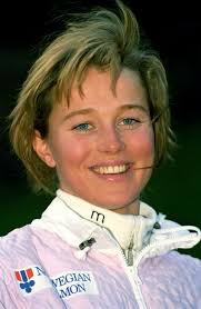 Image of NORWEGIAN SHOOTER HANSEN RIDES A SCOOTER IN OLYMPIC VILLAGE,  2000-09-14