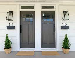 Entryway with dark gray door. How To Use The Sherwin Williams 2021 Color Of The Year