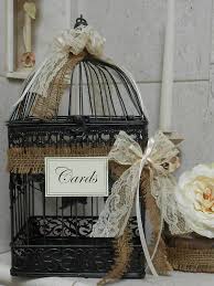 The link is a picture of an etsy bird cage that you could easily diy, you just need some ribbon, paper, and fake flowers which would all cost under $10 to make your own rather than spend $80. Best 22 Birdcage Decoration Ideas For Rustic Weddings Page 2 Of 2 Weddinginclude