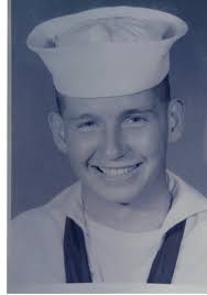 This 1956 photo is of Hopkins County Constable Arlin Elvis Curneal,  standing next to his 1955 Oldsmobile. Arlin was killed in a car wreck