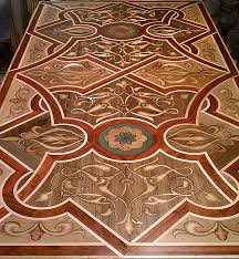 Wood medallions in the interior design styles medallions usually take a form of a circle or oval creating and decorative rosettes. Floor Medallions Wood Floor Designs Inlays Borders Parquet Designs Marquetry Wall Art