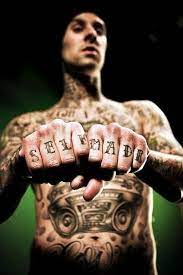 Travis barker's unexpected complication after plane crash. Travis Barker Travis Barker Tattoos Hand Tattoos Back Tattoo