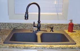 Heritage double handle kitchen faucet with side spray. Cool Kitchen Sink Designs Find The Right Kitchen Sink And Worktop Black Kitchen Faucets Minimalist Kitchen Sinks Kitchen Sink Design