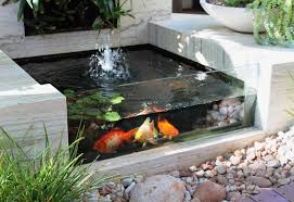12 Creative Koi Pond Projects You Can Create To Accent Your Backyard Koi Ponds And Water Gardens For Mo Water Features In The Garden Ponds Backyard Fish Pool