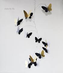 Hanging mobile gallery specializes in decorative hanging art including kinetic mobiles by top mobile designers for home and nursery decor. Butterfly Mobile Gold White Black 3d Butterflies Hanging Butterfly Mobile 3d Butterflies Hanging Mobile