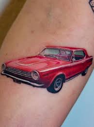 A close up of the doors of a green hot rod with flames. 50 Car Tattoos Designs Ideas Inspiration Tattoo Me Now