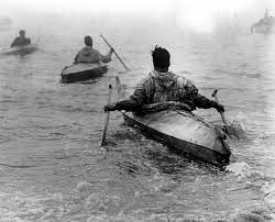 Eskimos Launching Kayaks Through The Surf Of The Bering Sea Alaska Kayaking Sea Kayaking Canoe And Kayak