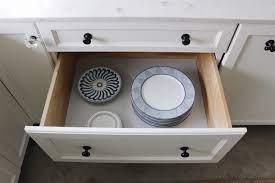 It will muffle the noises of banging pots and scraping dishware on bare cabinet shelves. Making Things Pretty Drawer Shelf Liners The Inspired Room