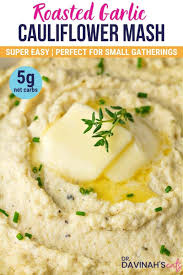 Satisfy Your Mashed Potato Cravings With This Easy Keto Roasted Garlic Cauliflower Mashed Cauliflower Roasted Garlic Cauliflower Vegetable Side Dishes Recipes