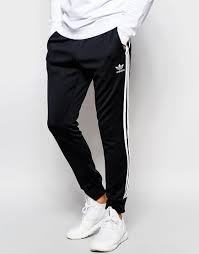 Adidas Originals Three Stripe Cuffed Sweatpants In Black Image 1 Of Adidas Originals Superstar Cuffed Trackpants Ab9706 Skinny Fit Adidas Originals