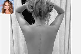163 powerful spine tattoos creativefan. Chrissy Teigen Tattoos Lyrics From John Legend S Song Ooh Laa Down Her Spine People Com