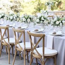 Spring Time For Outdoor Receptions We Love How Elegant Our Natural Oak Crossback Chairs With These White Flowers By Crossback Chairs Outdoor Reception Chair