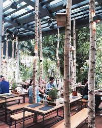 Lloydsinnexplores Hans Im Gluck A German Burger Restaurant Interspaced With Birch Trees To Create An Into The Woods Dining Experience