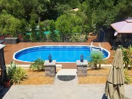 Above Ground Pool Installation Photos The Pool Factory Pools Backyard Inground Swimming Pools Backyard Above Ground Pool Landscaping