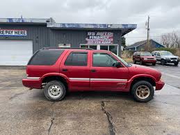 Image result for Medium Red 2002 Envoy