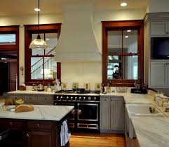 The Stained Wood Trim Stays 16 Wall Colors To Make It Sing Stained Wood Trim Dark Wood Trim Stained Kitchen Cabinets