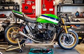 Pin By Denny Turnbull On Motorcycle Garage In 2020 Motorcycle Garage Motorcycle Moped