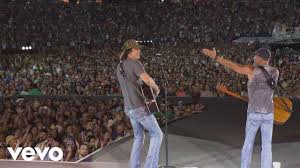 Country Superstars Kenny Chesney And David Lee Murphy Play