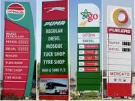 Sign boards of petrol stations.
