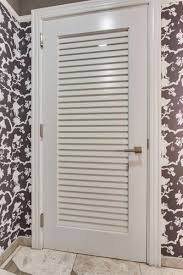Envivo Louver Doors By Vt Industries Vtindustries Louverdoors Louver Envivo Bathroom True False Residential Doors Doors Interior Tall Cabinet Storage