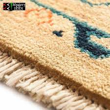 wool rug handmade natural cream
