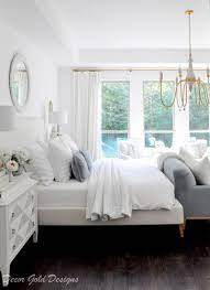 A white and gray combination is the right color scheme for this master bedroom. Master Bedroom Decor Gold Designs
