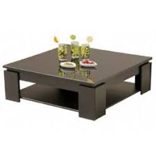 A solid wood coffee table placed right at the centre of the living room is nothing less than a visual treat. Pin On A