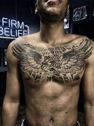 Angel wings chest tattoos for men. Black And Grey Angel Wings On Chest Chest Tattoo Men Wing Tattoo Men Tattoos For Guys