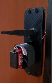 After a bit of research i found a device in which you can use the door latches hole. Diy Home Door Smart Lock Controlled By The Phone Opening Closing Remotely Raspberry Pi