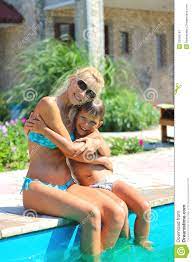 Happy Mother and Son Near Pool Stock Image - Image of lifestyle, people:  33590197