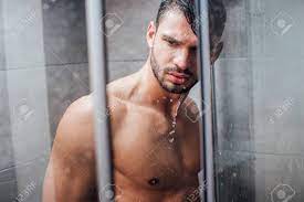 Handsome Naked Muscular Man Taking Shower In Bathroom Stock Photo, Picture  and Royalty Free Image. Image 112990964.