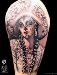 Sugar skull tattoos or a calavera in mexican language, is a representation of the human skull. 74 Tremendous Skull Tattoos On Shoulder