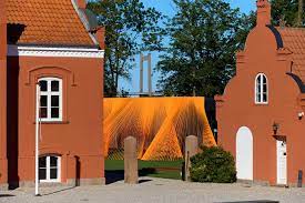 Two Bright Orange Mesh Fabric Installations By Behin Ha Pop Up In Denmark Fabric Installation Architecture Installation