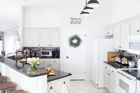 Choose a shaker style or a the darkened nature of gray cabinets is best suited for a lighter, complementary color. Rustic Gray Farmhouse Kitchen Reveal T H Kitchen Makeover Table And Hearth