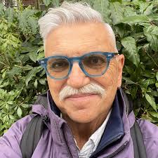 This is the pattern by Gail Pinder, I found in files, for the baseball cap.  x