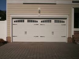 Ideas Bright White Double Carriage Garage Doors On Brown Garage Design Interesting Carriage Garag Carriage Style Garage Doors Garage Doors Garage Door Styles