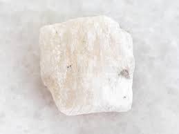 The mineral gypsum is chemically named as calcium sulfate dehydrate. Raw Gypsum Stone On White Marble Stock Image Image Of Sedimentary Gemmological 113708537