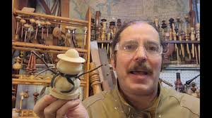 How to turn a snowman with a hat, scarf and arms