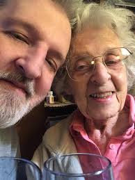 In my Father's Absence Mum is consoling me to be the man he trained me to  be. From the small room of grief, where I stood reminiscing the sweet  memories I had