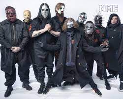 He was the drummer for a thrash metal band called modifidious, which opened for a band called atomic opera, of which future slipknot guitarist jim root was a member, per slipknot: Slipknot S Tortilla Man Has His Mystery Identity Been Revealed
