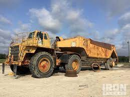 Belly dump trailer contents can be unloaded in a long line (windrow) while the truck is moving, which allows them to spread material over a large area. Cat 776b Off Road Belly Dump Truck In Beckville Texas United States Ironplanet Item 4190773