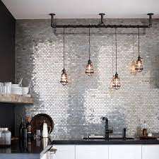 10 Industrial Lighting Ideas You Can Buy Or Diy Hunker Industrial Kitchen Lighting Industrial Light Fixtures Diy Industrial Lighting