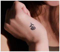 Beautiful concept of a cage left opened to release and set them free. 101 Small Tattoos For Girls That Will Stay Beautiful Through The Years