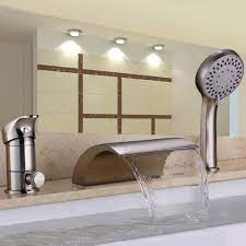 Choosing a tub and shower faucet for your bathroom renovation is an important decision. Victoria Waterfall 3 Hole Roman Tub Faucet With Hand Shower Roman Tub Faucets Bathtub Faucet Tub Faucet
